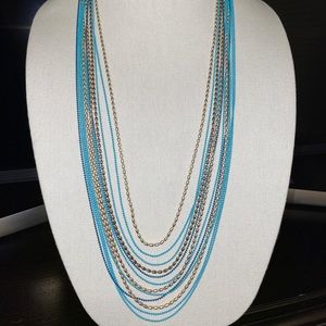 Multilayered long necklace
